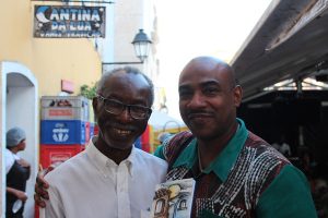 with author and restaurant owner Clarindo Silva in front of his restaurant in Salvador, Bahia